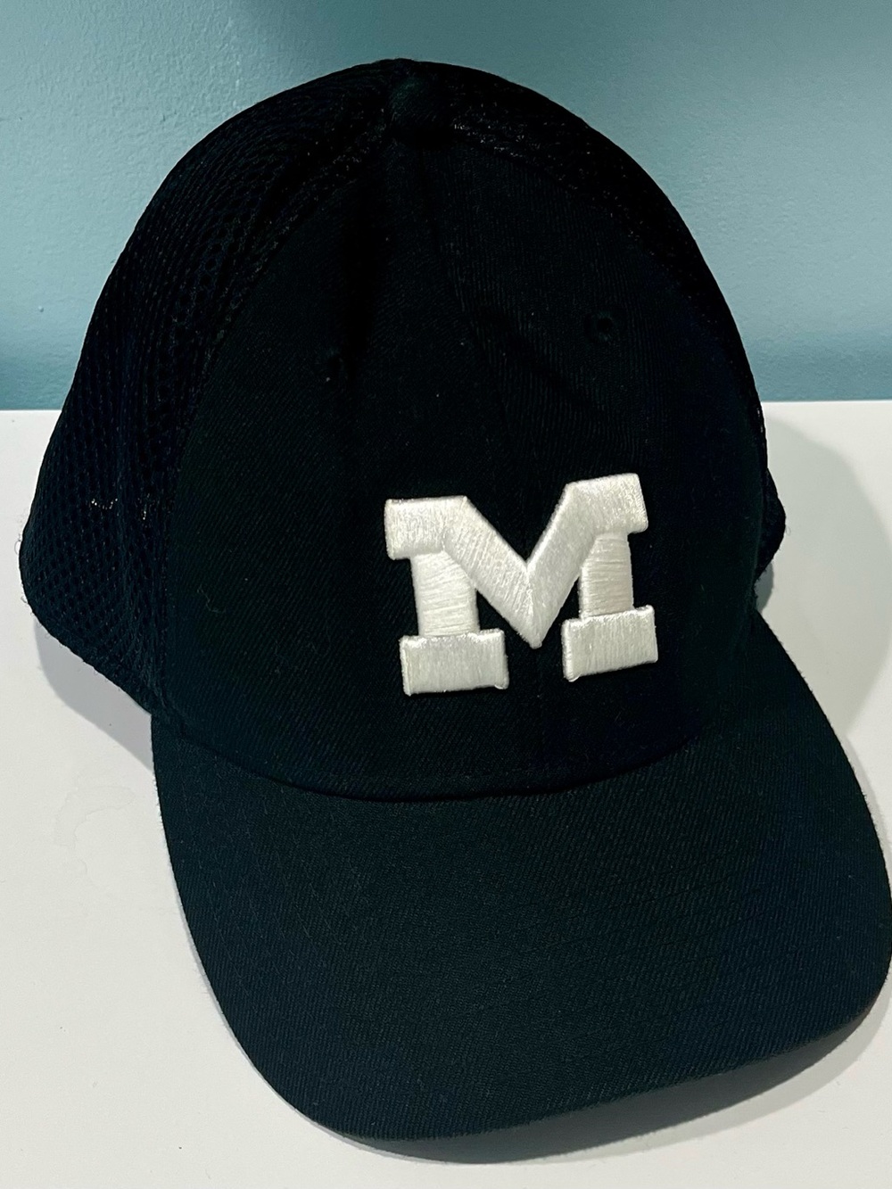 Black Baseball Cap with White 'M' Patch